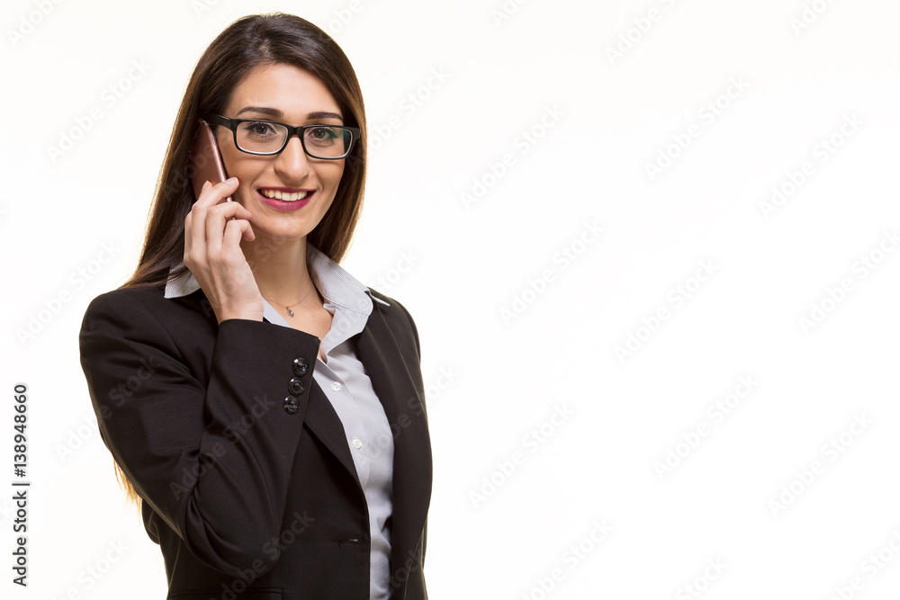 Young businesswoman talking with smart phone. Young businesswoman talking with smart phone.