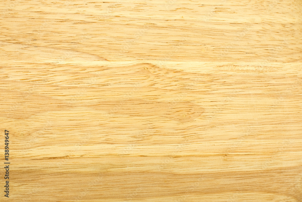 Naklejka premium The light brown wood texture background.