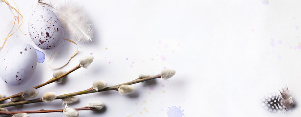 Easter background with Easter eggs and spring flowers. Top view with copy space