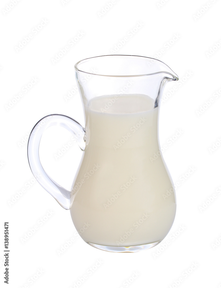 Glass jug of fresh milk isolated on white Glass jug of fresh milk isolated on white