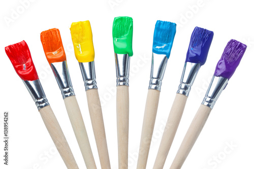Colorful Paint Brushes with the Colors of the Rainbow, simple isolated in white shots