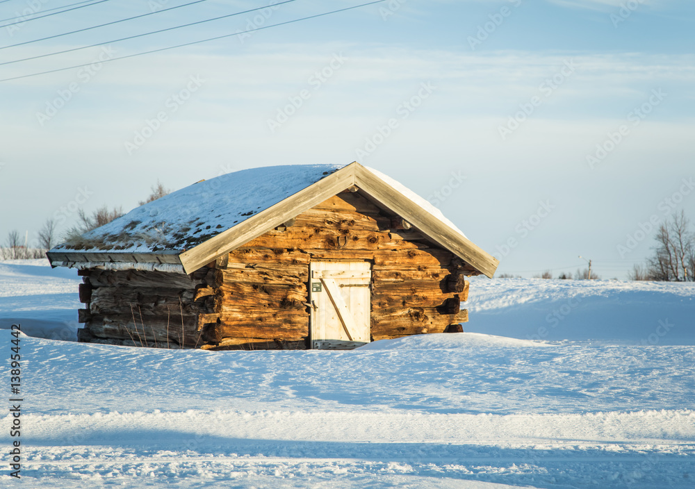 A beautiful old wooden house in the winter scenery