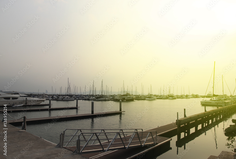 Boats Docked at the Yacht Club, Evening view of yachts at the Port.