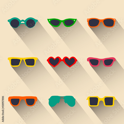 Vector set of icons of different shapes glasses in trendy flat style with long shadows effect.