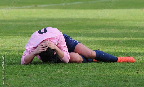 la douleur du joueur au football