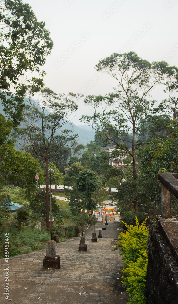 White stupa road under Adam's Peak in Sri Lanka White stupa road under Adam's Peak in Sri Lanka
