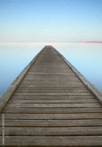 Fototapeta Naklejka Na Ścianę i Meble -  Zen jetty on misty lake