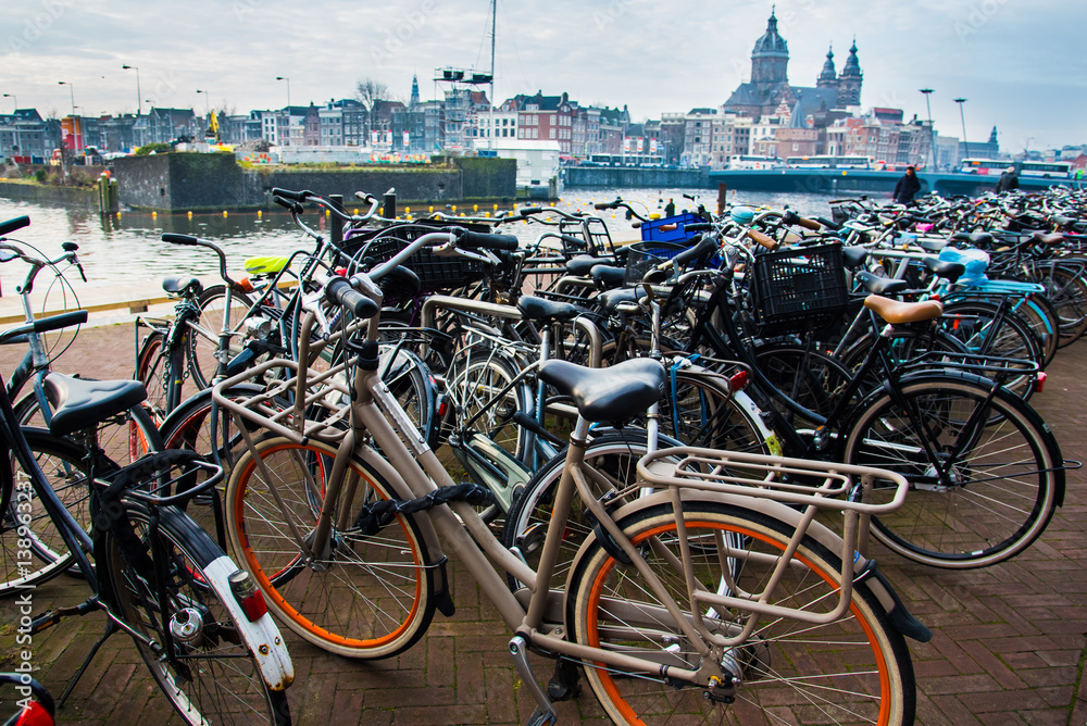 Bicycles in Amsterdam. City landscape. Winter season