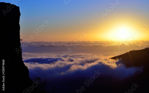 Sunrise over the sea of clouds, summit of Gran canaria, Canary islands