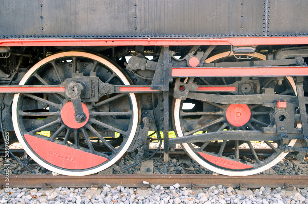 Close up of old steam locomotive wheels. Close up of old steam locomotive wheels.