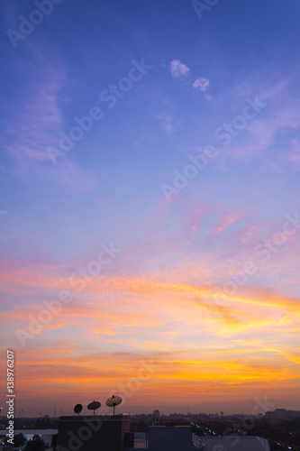 sunset sky with rays of light shining clouds and sky background and texture © lukyeee_nuttawut