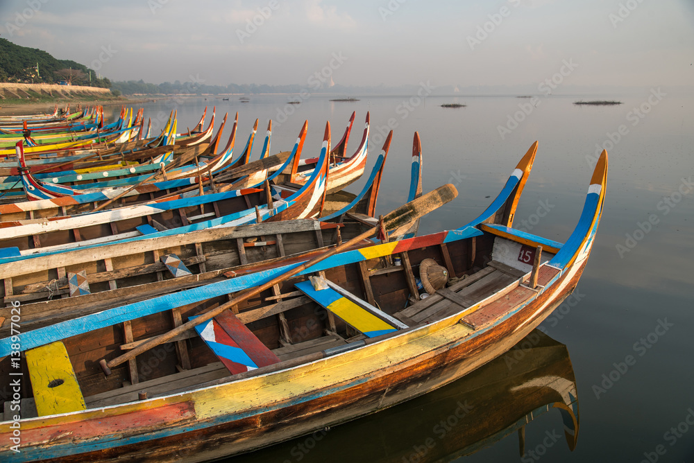 traditional boat near the U Bein Bridge, Mandalay, Myanmar