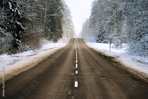 Winter forest and Auto road