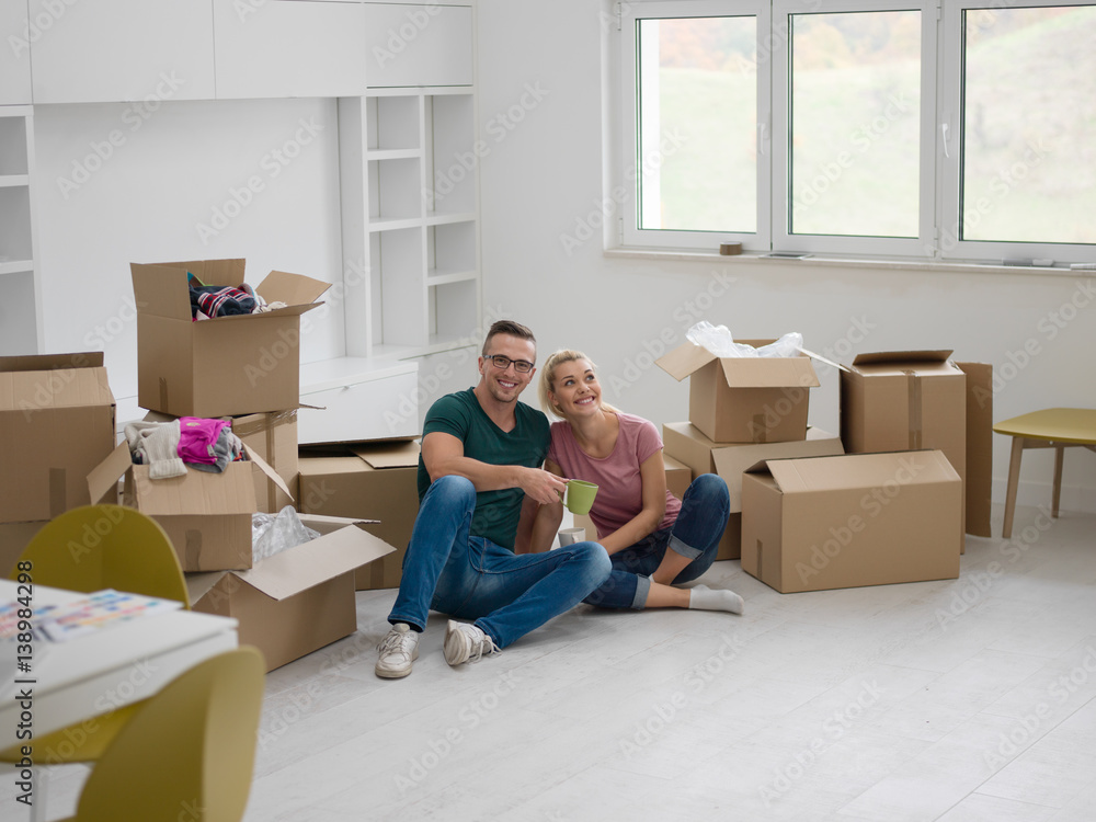 young couple in new house young couple in new house
