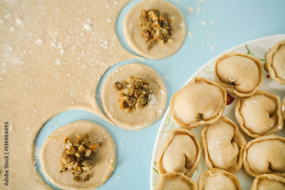 raw homemade ravioli on the plate raw homemade ravioli on the plate