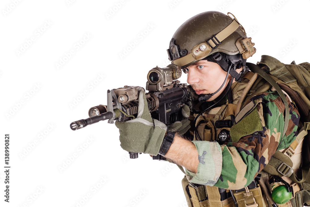 Fototapeta premium Portrait soldier or private military contractor holding sniper rifle.