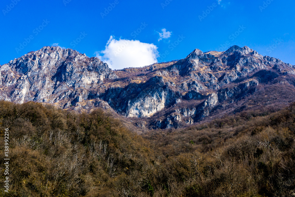 Fototapeta premium Mountains and cliffs during winter in Valtellina, Italy