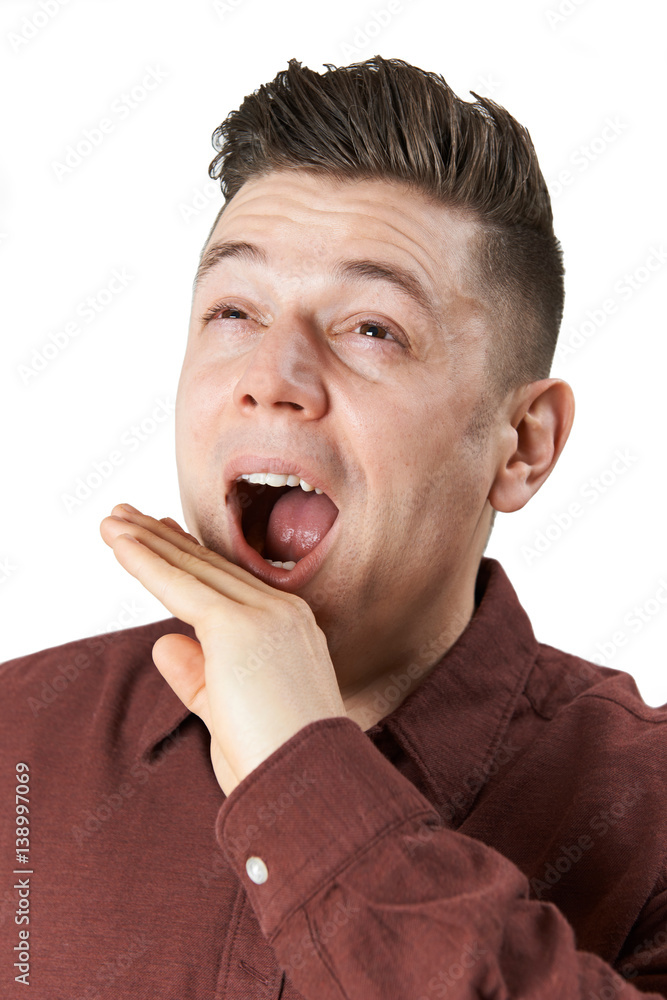 Studio Shot Of Man Yawning Studio Shot Of Man Yawning