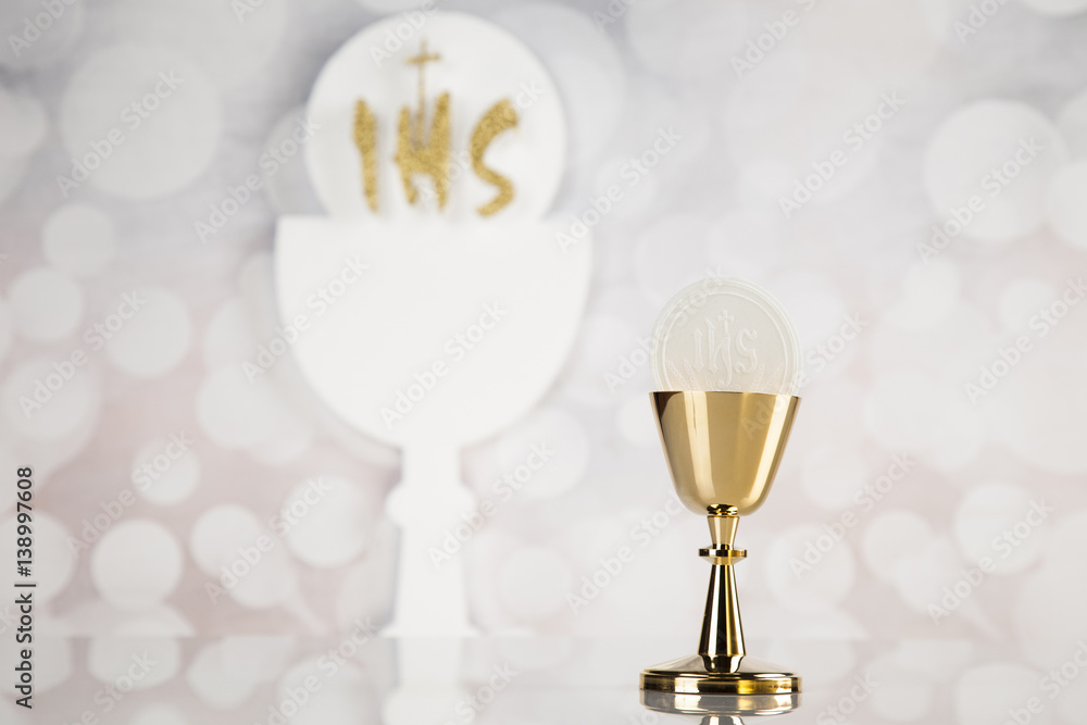 Holy communion a golden chalice, composition isolated on white Holy communion a golden chalice, composition isolated on white