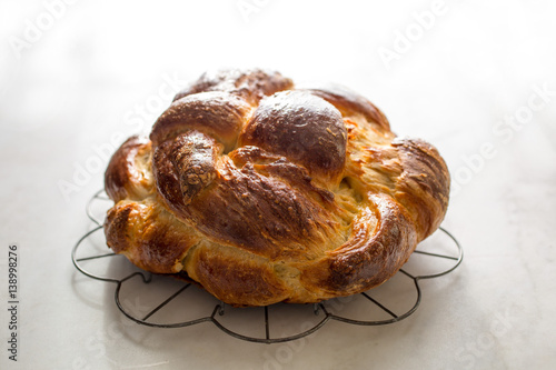 Baked, orange olive oil challah bread, close-up
