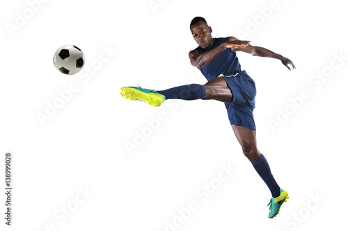 African AmericanSoccer Player Kicking Ball © R. Gino Santa Maria