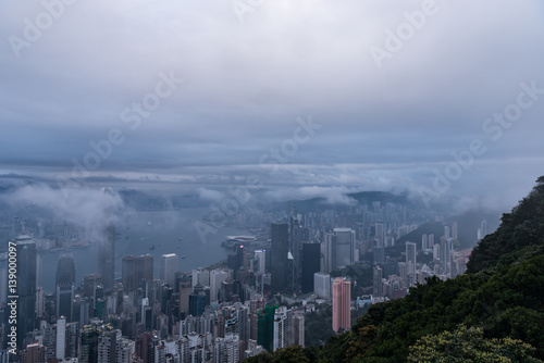 Misty morning view of Victoria harbor of Hong Kong city © kingrobert