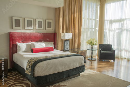 hotel room modern with king bed and natural light