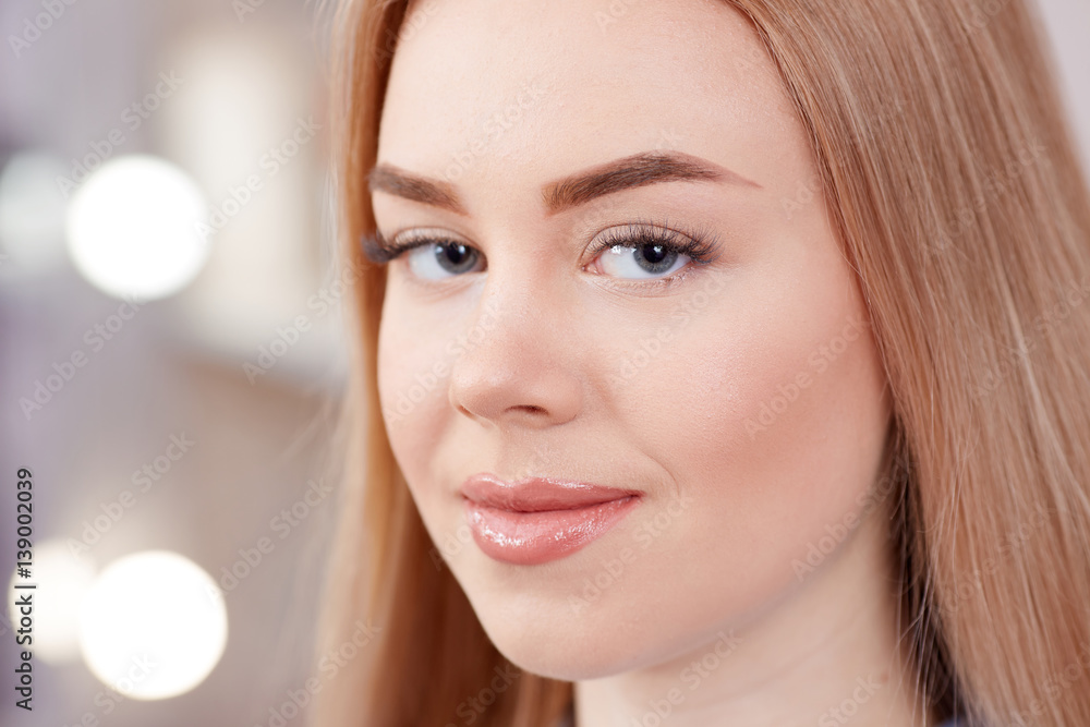 Girl after procedure of permanent makeup of eyebrows. Girl after procedure of permanent makeup of eyebrows.