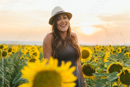 Standing in a sunflower field