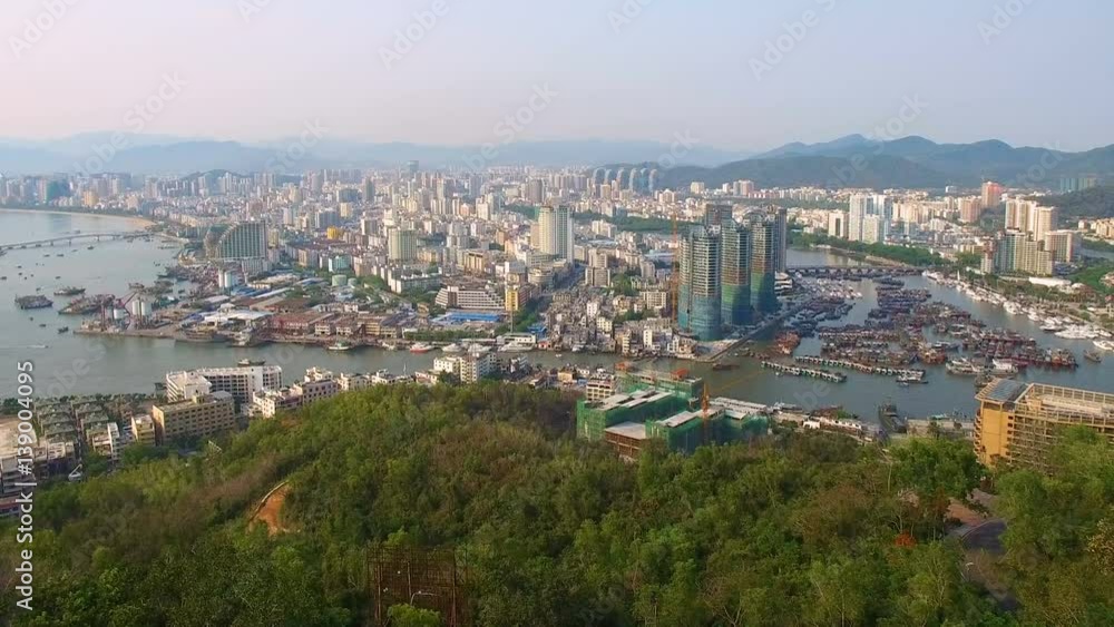 Modern city with skyscrapers on the island aerial view Modern city with skyscrapers on the island aerial view
