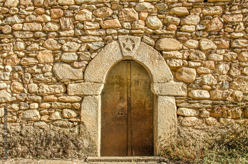 Stone wall with door