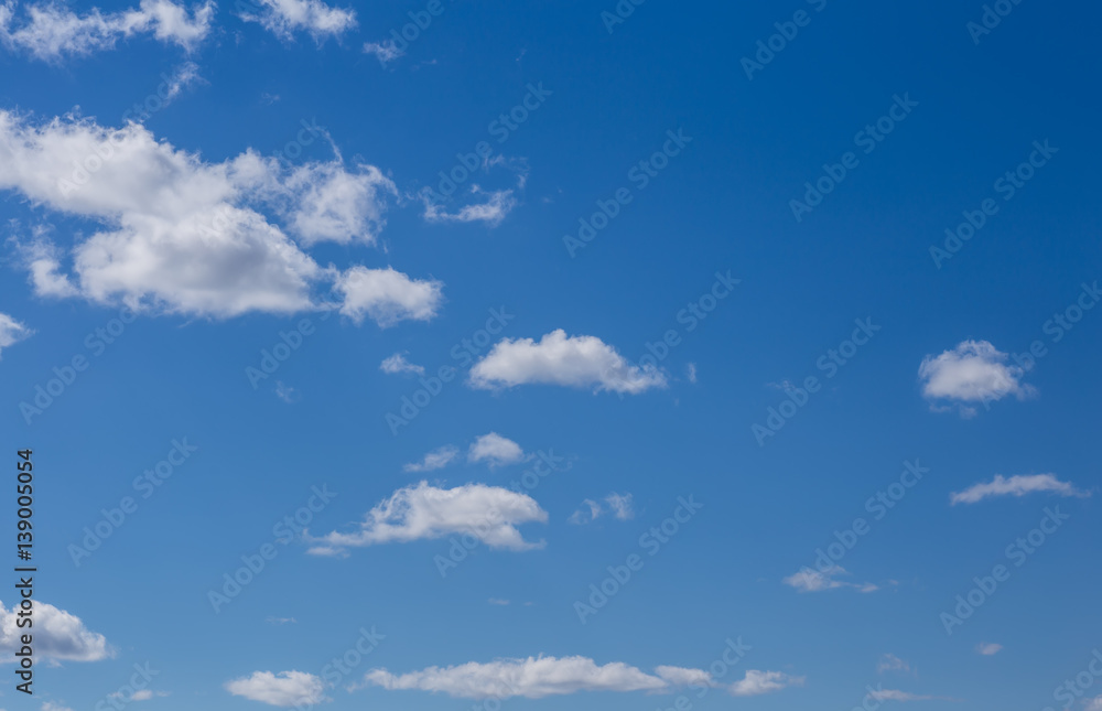 the clouds drifting across the blue sky the clouds drifting across the blue sky