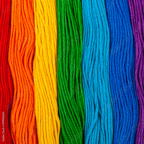 Colorful Embroidery Floss Background. Selective focus.