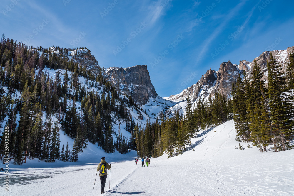 Crossing the frozen surface of Dream Lake, Rocky Mountain National Park, Colorado