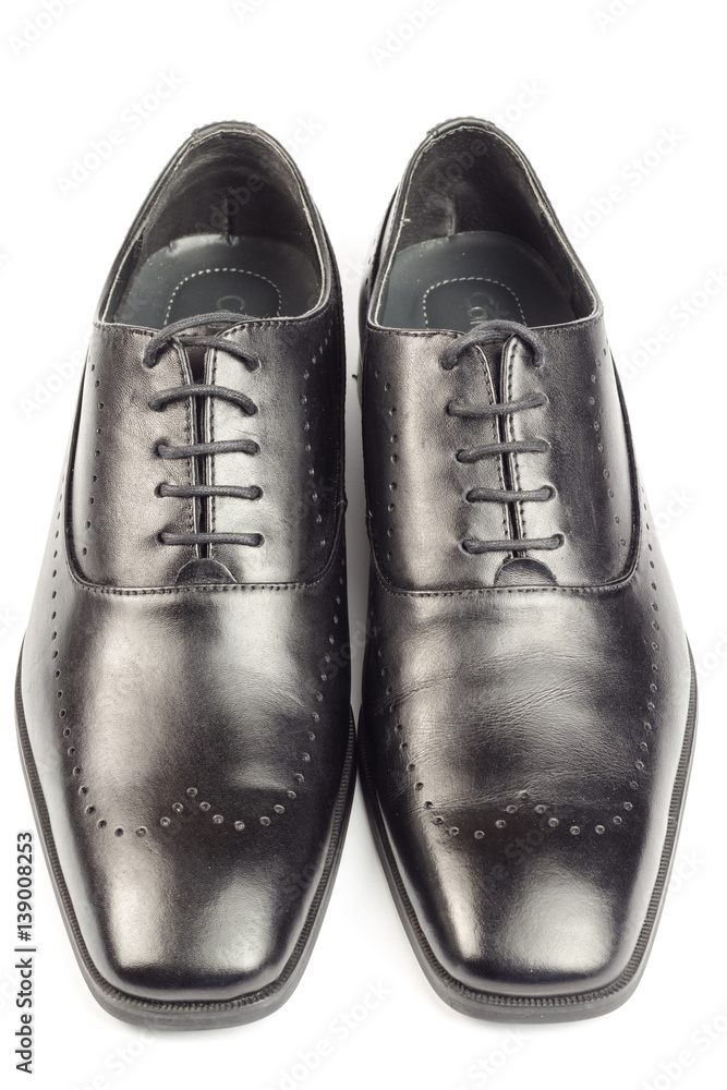 Classic black leather men's shoes isolated on white background.