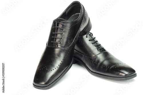 Classic black leather men's shoes isolated on white background.
