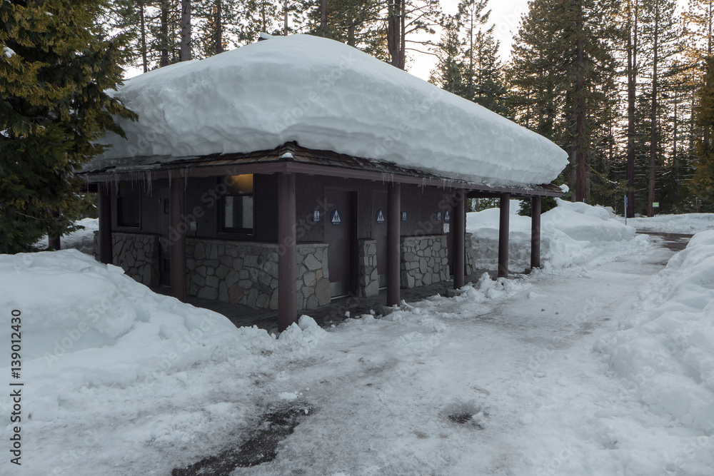 Roof of a restroom under deep snow cover