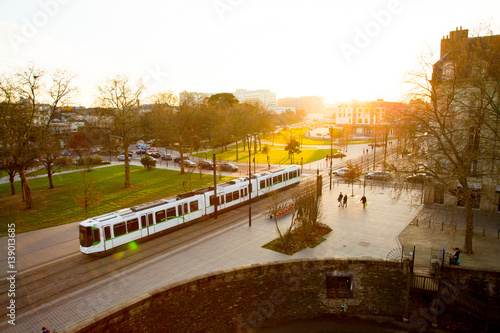 Tram rides through the city center of Nantes, France