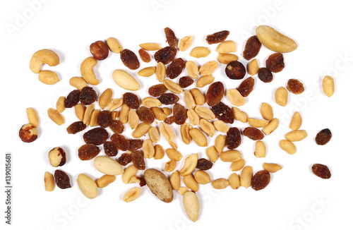 Healthy food, pile of mixed nuts, cashews, peanuts, hazelnut, raisins, brazilian nut, almond, isolated on white