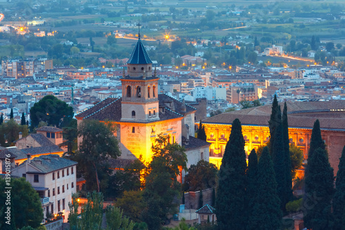 Iglesia de Santa Maria in palace and fortress complex Alhambra during evening blue hour in Granada, Andalusia, Spain
