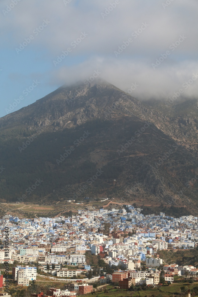 The town of Chefchaouen in Morocco at the foot of the mountain