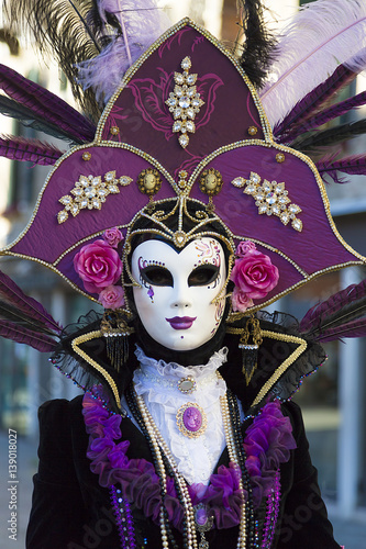 VENICE, ITALY - February 25, 2017  Person in Venetian costume attends the Carnival of Venice