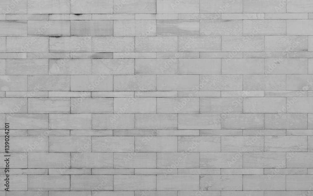 Fototapeta premium Pattern of sand stone tile wall