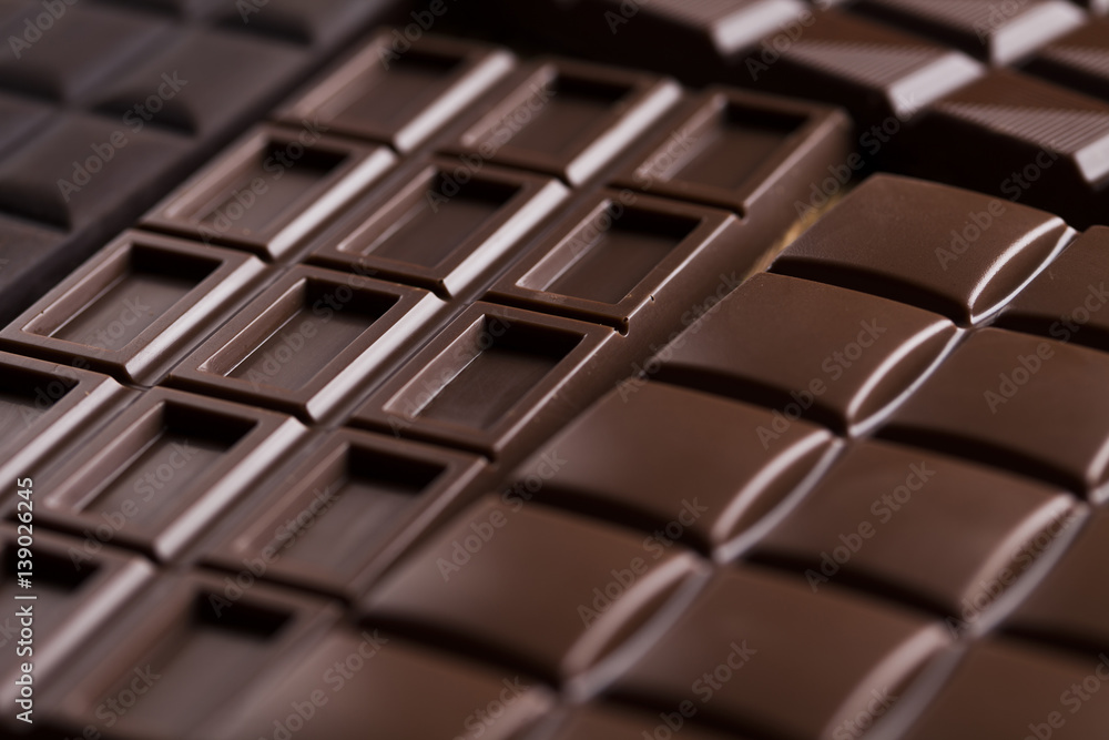 Fototapeta premium Chocolate bar, candy sweet, dessert food on wooden background