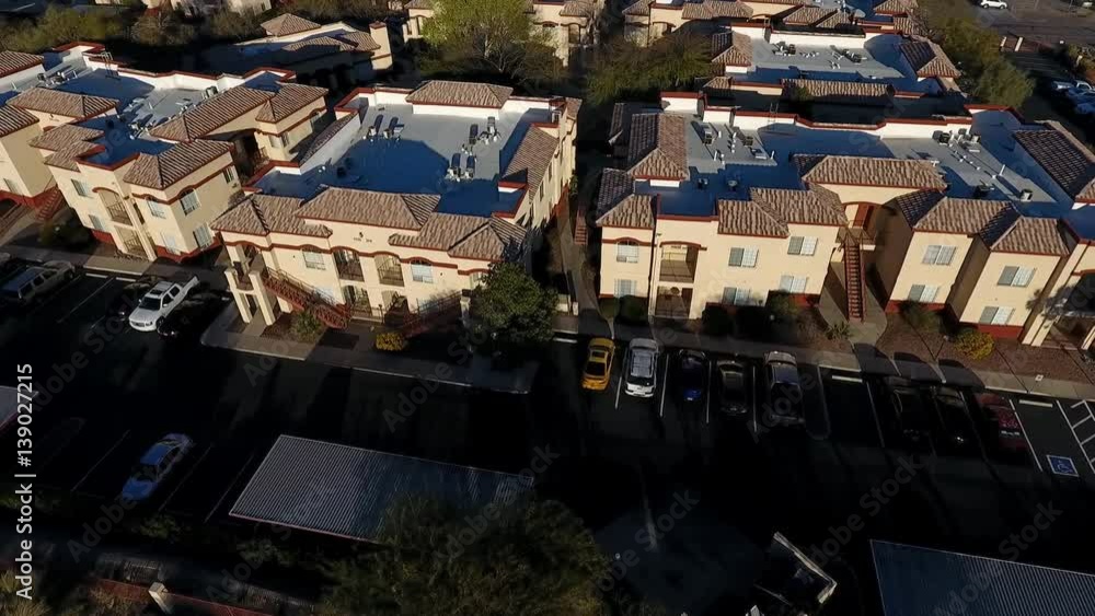 aerial shot of an apartment or condo complex aerial shot of an apartment or condo complex