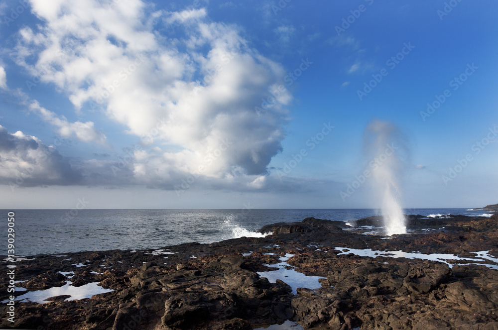 Blow hole at Spouting Horn, South shore, Kauai, Hawaii Blow hole at Spouting Horn, South shore, Kauai, Hawaii