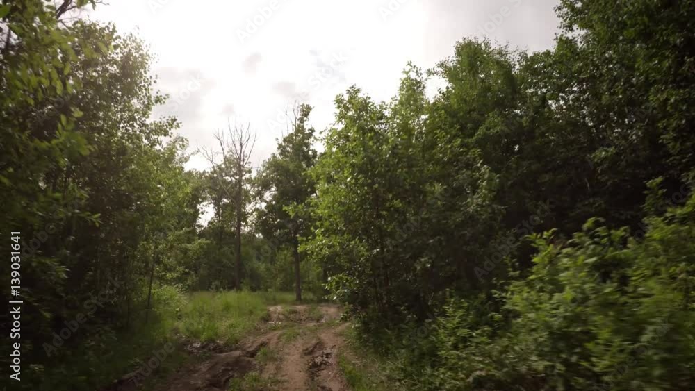 Cross Country Cycling over Muddy Terrain on a Cloudy Day. Video 4k Cross Country Cycling over Muddy Terrain on a Cloudy Day. Video 4k