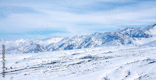 snow-capped mountains © kvdkz