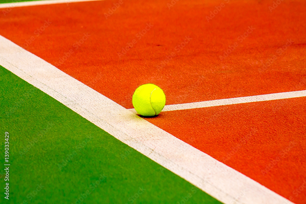 a tennis ball on the court