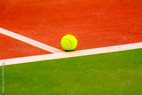 a tennis ball on the court